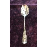 Antique silver spoon with floral decoration to handle and back of bowl, nice condition with a
