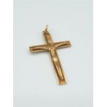 18ct yellow gold crucifix, weight 3.1g and 35mm long