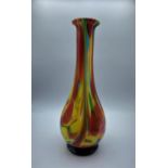 Multi coloured fluted glass vase at a height of 29cm.