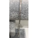 18k white gold tennis bracelet with princess cuts of top quality diamonds around 4ct