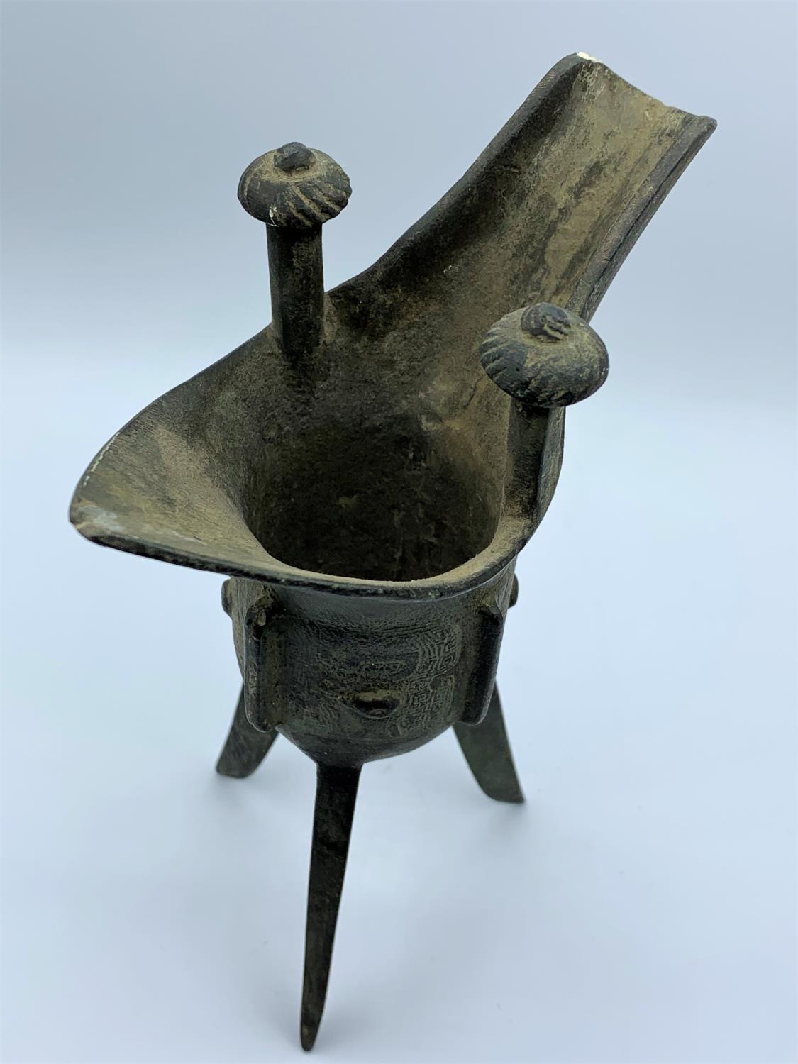 A very early patterned cooking cauldron with 3 legs which is believed to be roman. 19.5cm high - Image 9 of 9