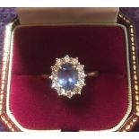 Quality stone set sapphire and diamond ring, a semi transparent sapphire of almost 1ct with a 12