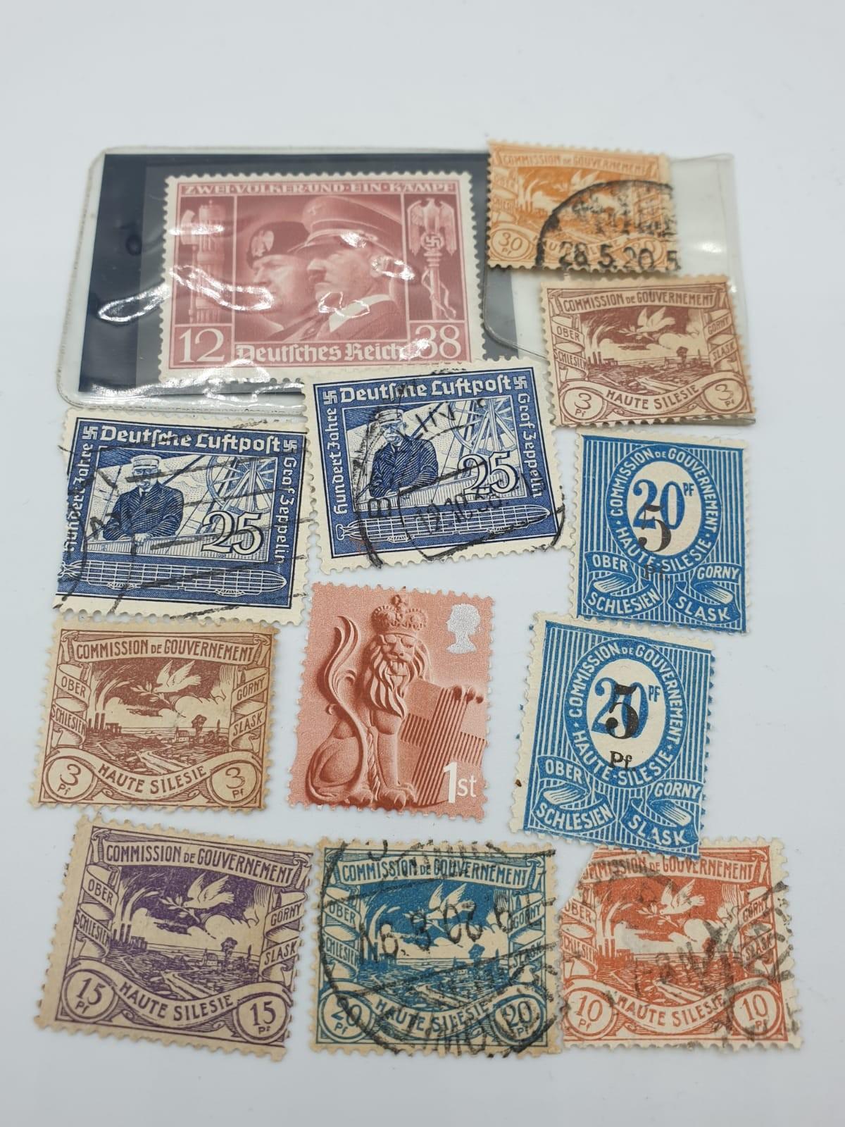 Assortment of 12 German postage stamps from 1930s to include unused Hitler mussolini stamp.