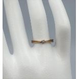 9ct yellow gold ring with one small central diamond, weight 1.1g and size N