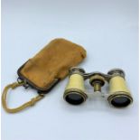 Vintage theatre binoculars with original carry case.