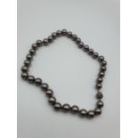 Celtic round black/silver pearl necklace with 18ct white gold clasp, weight 76g and 44cm long