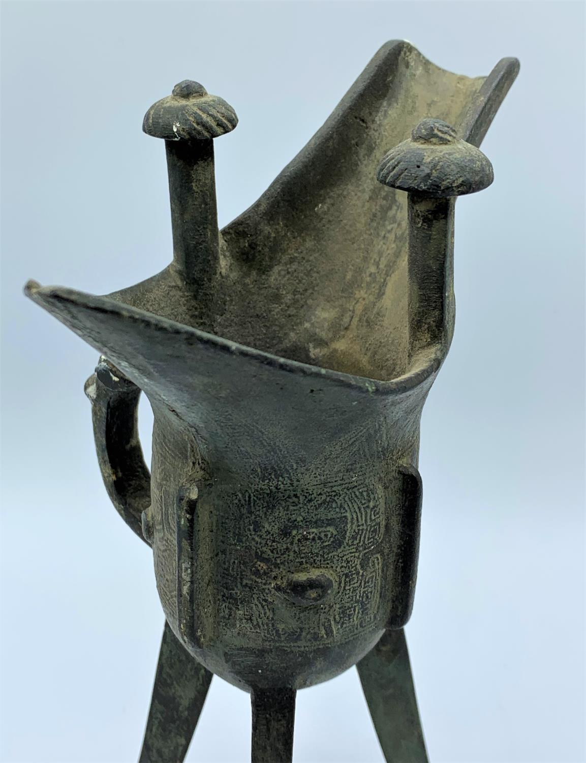 A very early patterned cooking cauldron with 3 legs which is believed to be roman. 19.5cm high - Image 4 of 9