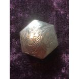 Silver hexagonal snuff/pill box, 35 x 10mm, lid having floral scroll work with a perfect hinge, base