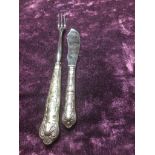 Two silver king patterned utensils, 1x pickle fork 1977- 22cm and 1x butter knife 1986- 16cm, full