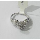 9k white gold cluster ring with diamonds (0.25ct approx), weight 3.4g and size N1/2 (ECN446)