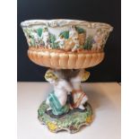 Large Portuguese ceramic pottery centerpiece fruit bowl featuring a part gilded bowl supported by