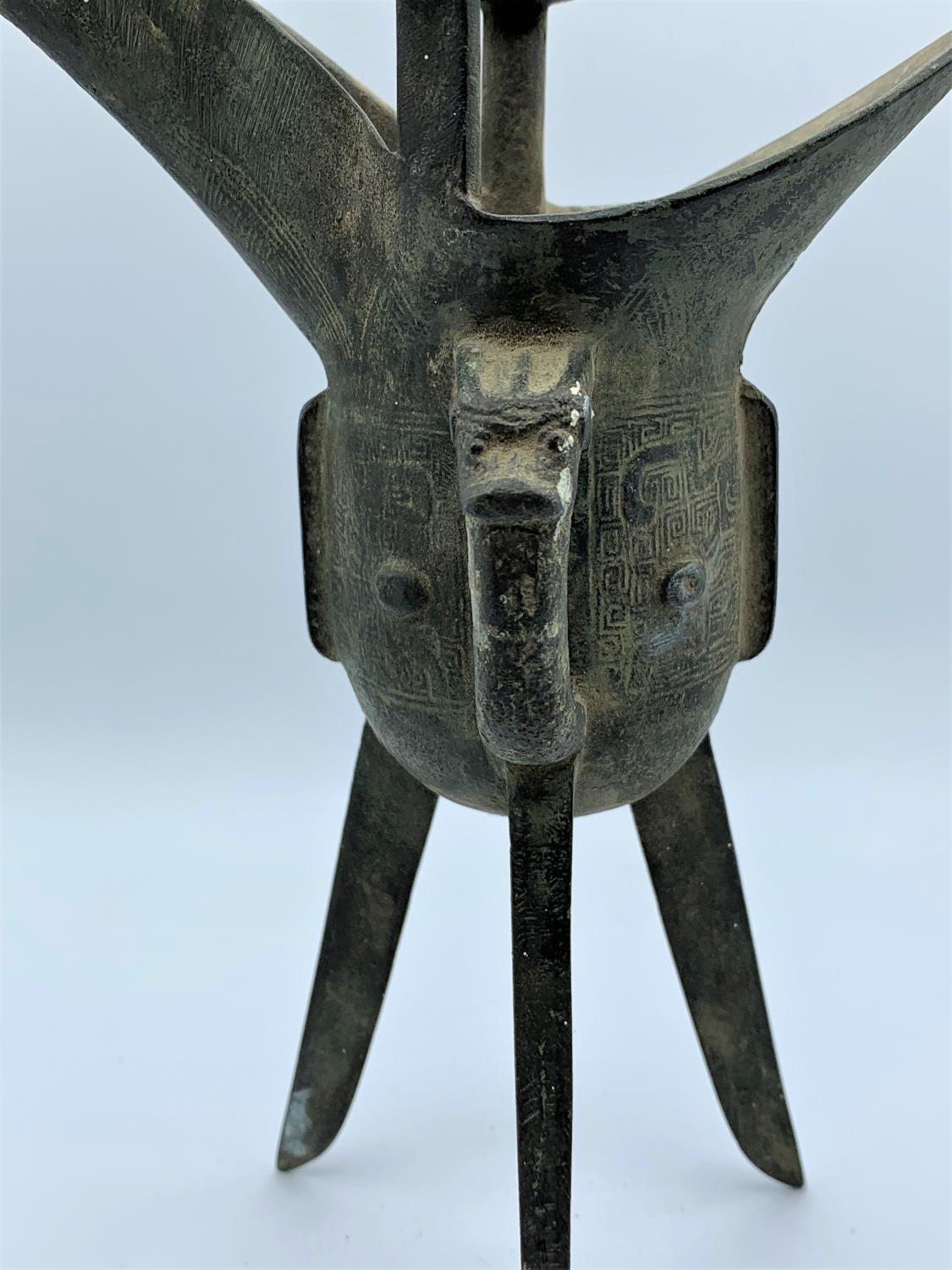 A very early patterned cooking cauldron with 3 legs which is believed to be roman. 19.5cm high - Image 5 of 9