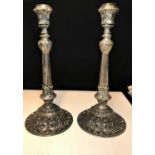 A pair of large ornate silver plate candlesticks circa 1930, with a weight of 5.7kg