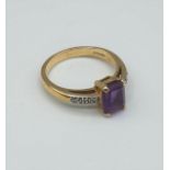 9ct yellow gold ring with emerald cut amethyst centre stone and diamond shoulders, weight 3.6g and