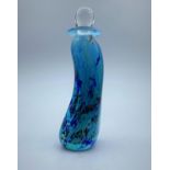 An unusual shaped scent bottle with blue colouring. 16cm high and and the width is 7cm.