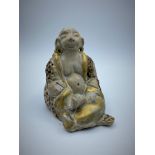 Early Japanese clay drunken Buddha sculpture with gilding, size 11 x 7cm and weight 393g approx