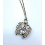 Small silver butterfly pendant with pale blue stone and 40cm silver necklace, weight 2.6g