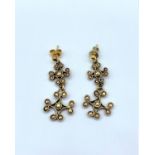 Pair of ornate gold plated silver earring, weight 5.7g
