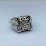 18ct white gold ring with diamonds (approx 0.94ct),weight 12.9g and size U