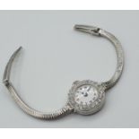 1920'/30's ladies dress watch in 18ct white gold and platinum with diamond bezel, weight 20g