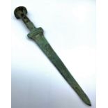 A bronze dagger in the Gladius style, believes to be from Roman era. Wrighing 343g and is 33cm long.