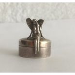 Rare and unusual miniature silver pill box with seated fairy, having hinged lid and full hallmark to
