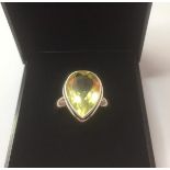 Stone set silver and citrine ring size M, marking inside band for 925 and the genuine gemstone