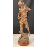 Bronze statue of boy carrying a bucket, signed to base RANCOULET H38cm