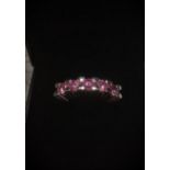 Silver ring stone set with five pink Zirconias, marked 925 CZ and size O