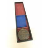 SS 4 year medal in box