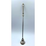 Vintage white metal candle snuffer. It is 26cm long.