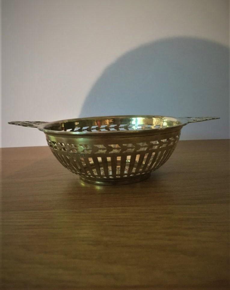 Vintage silver bon bon dish, having twin handles and pierced decoration to bowl and handles, clear