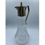 Vintage English glass and silver plate claret jug. Perfect condition heavy glass. It is 30cm tall.