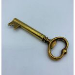 Novelty copper and brass corkscrew key. It weighs 70.8g and the length is 11.5cm.