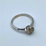 18ct white gold ring with 0.88ct solitaire champagne diamond, weight 2g and size J