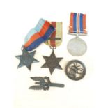 Set of long range desert group medals and badges to include Africa Star LRDG badge SAS who dares