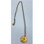 Yellow metal St Christopher pendant on 46cm necklace, weight 3.6g