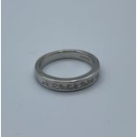 18ct white gold half eternity ring with princess cut diamonds (approx 0.25ct) , weight 3.9g and size