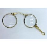 Vintage Lorgnette folding glasses set in 14ct gold frame