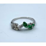 9ct white gold ring with diamonds and emeralds, weight 2.8g and size Q/R