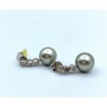 Pair of silver pearl and diamond (0.3ct) earrings, weight 5.5g