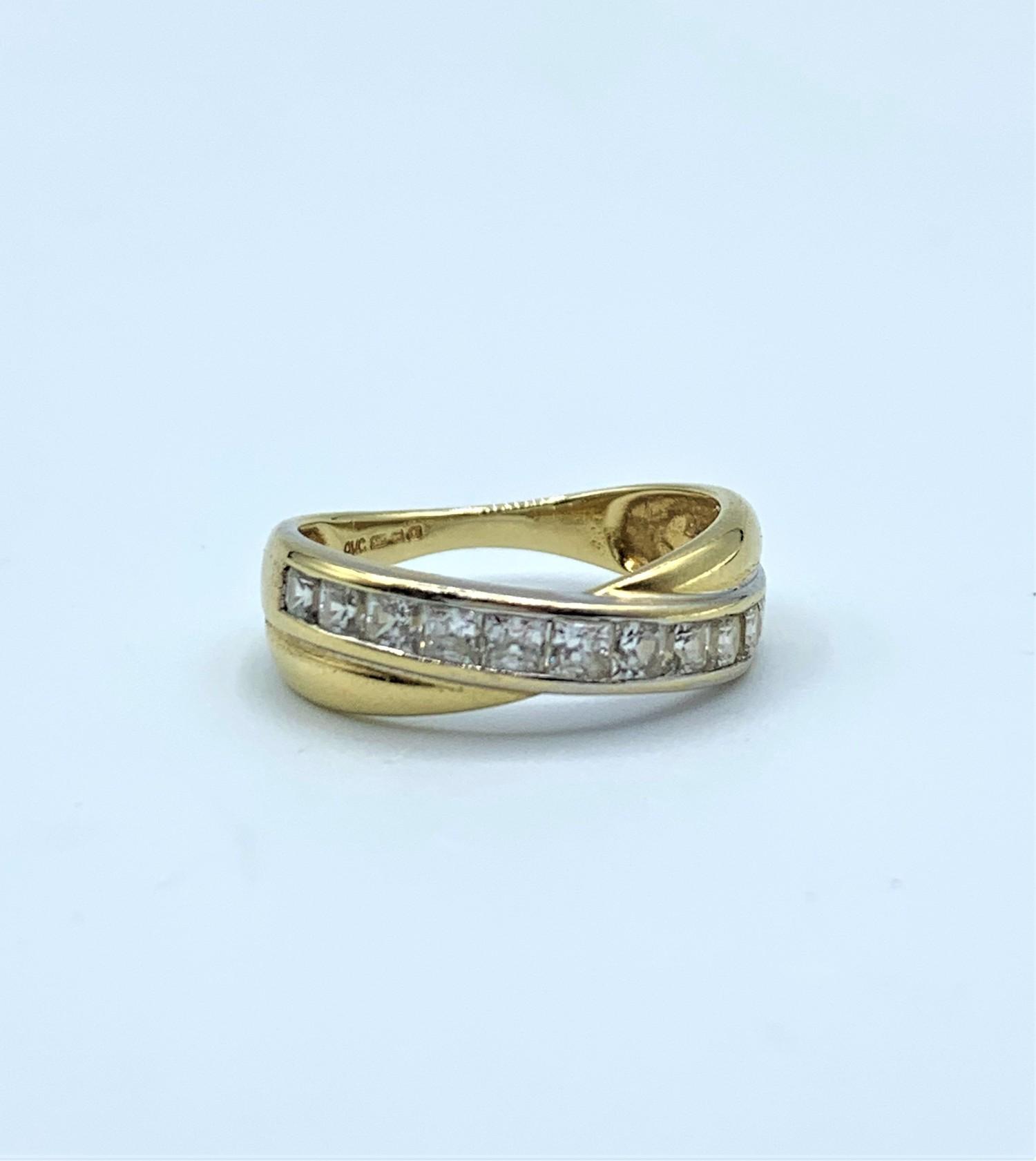 9ct yellow gold crossover ring, size K-L.