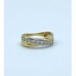 9ct yellow gold crossover ring, size K-L.