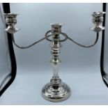 Vintage large silver plated candelabra. Converts to single candle stand. Single candle is 19cm and
