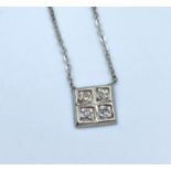 9ct white gold and diamond necklace having a square pendant with 4 small diamonds (0.15ct), weight