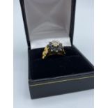 18ct yellow gold antique ring with diamond centre and sapphire surround in claw set, size L and