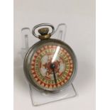 Vintage spinning gaming pocket watch with roulette design on the face, in working order.