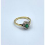 18ct Yellow Gold Ring with Emerald Centre Stone in Claw Setting Surrounded by Diamonds, 2.5g Size N