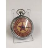 Vintage spinning gaming pocket watch with a star and dice design on the face, in working order.