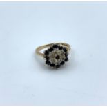 9ct yellow gold ring with sapphire and diamonds, weight 2.9g and size J